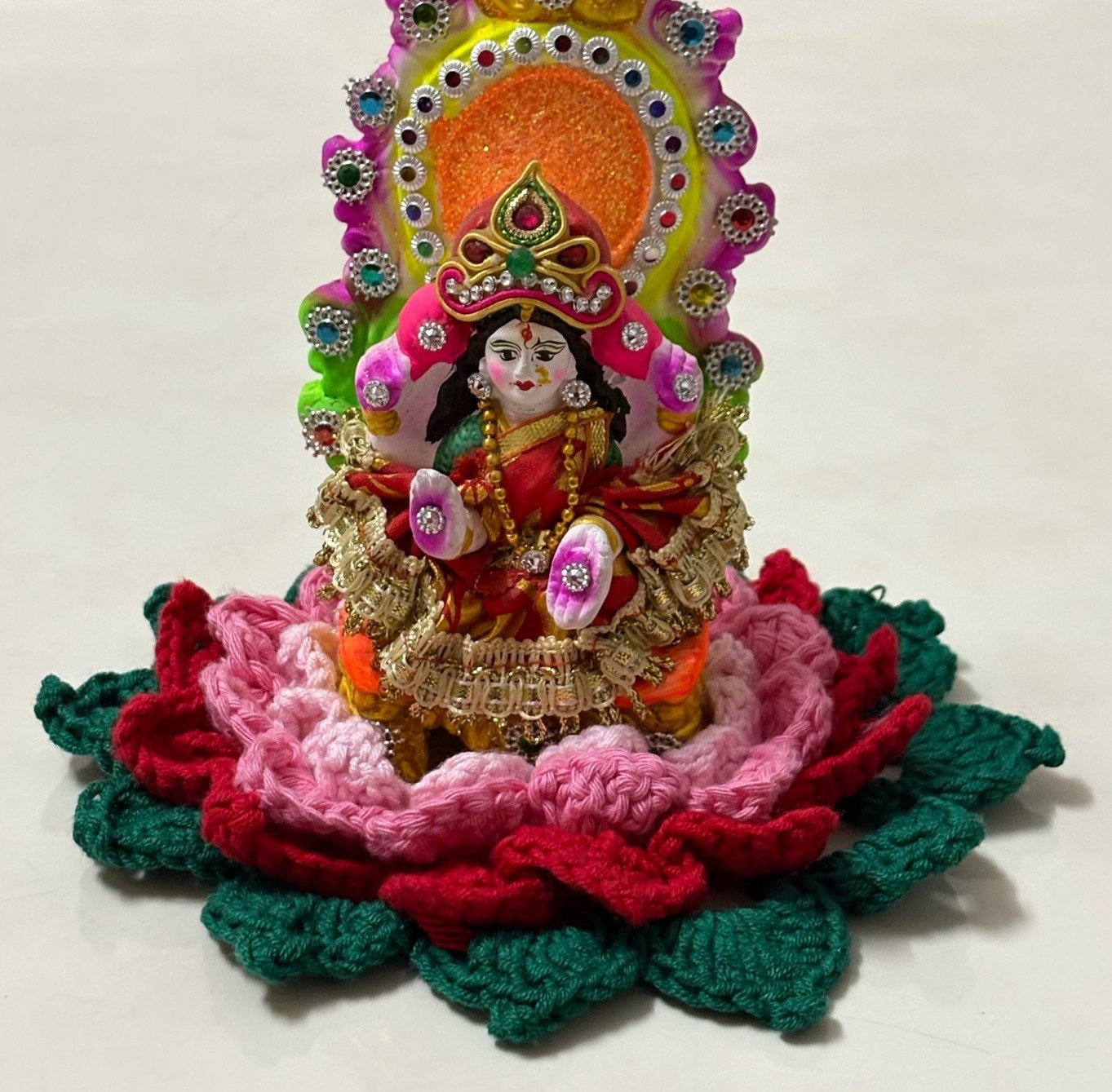 Hand-crocheted Saraswati idol with lotus